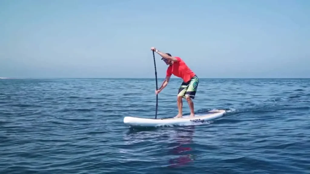 Stand-up paddler testing blade performance