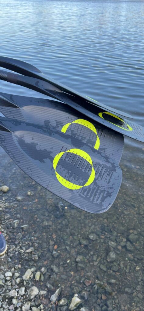 FLOWFORCE paddle blades beside the water